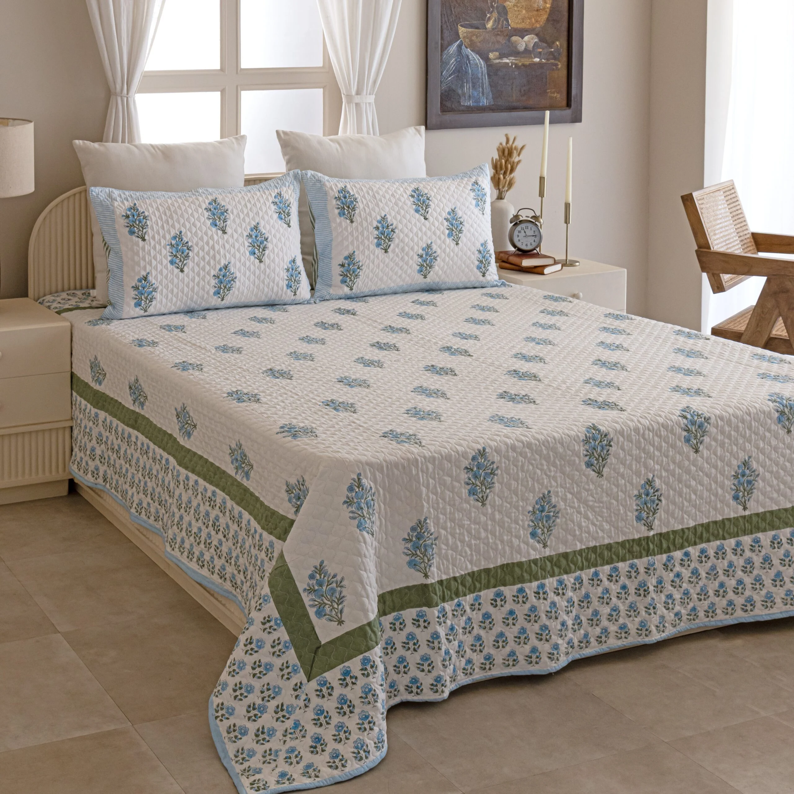 Neel Grove hand block printed bedspread on a bed