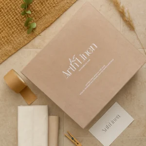 Arth Linen branded kraft gift box with a gift card