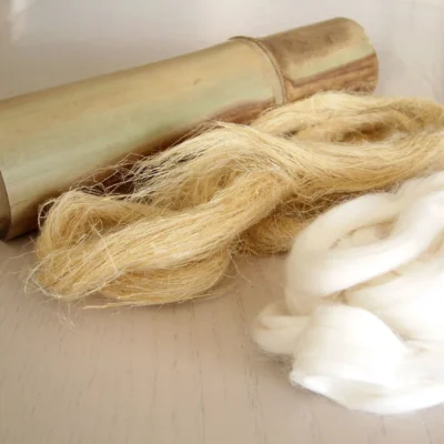 Bamboo stalk with raw bamboo fibre and yarn